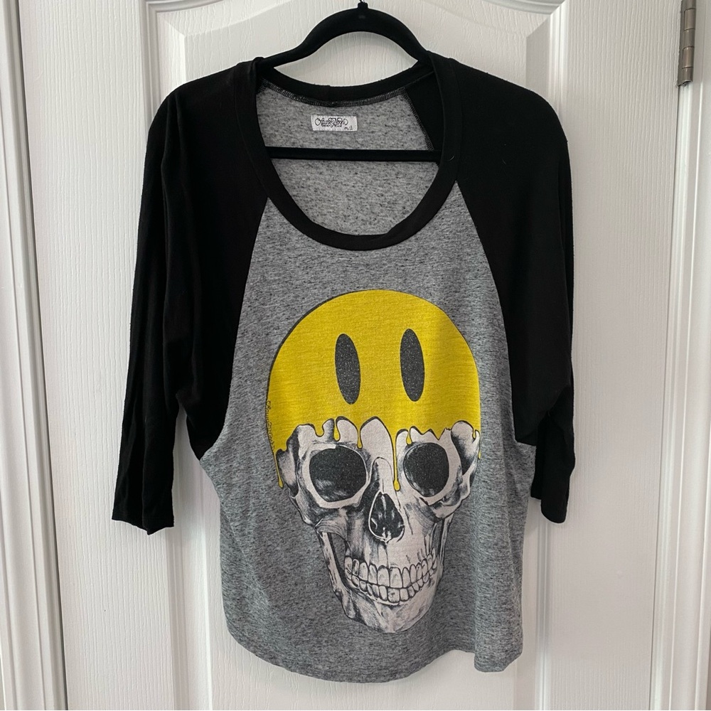 Lauren Moshi grey and black baseball raglan with melted smiley skull graphic